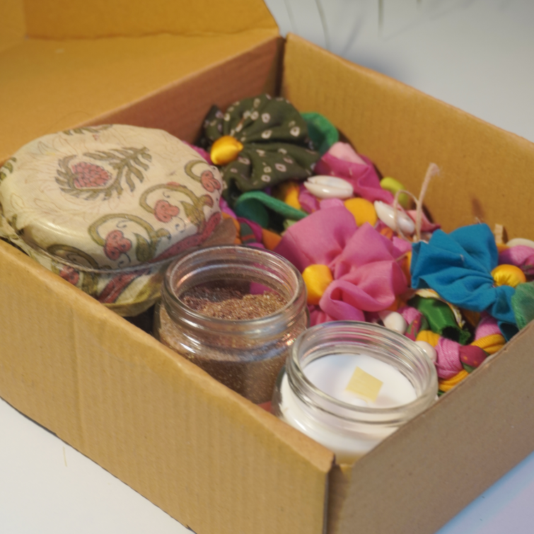 Eco Diwali Gift Box 1 | Upcycled Flower Toran | Soy Candle Jar | Dates Jar with Filling | Coffee & Orange Body Scrub